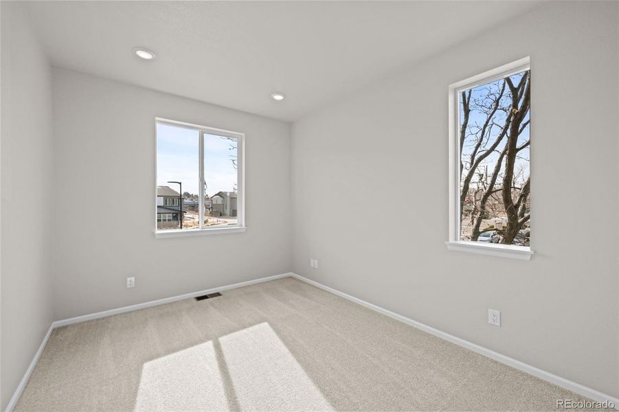 Spacious, unfurnished interior of a new home in Ralston Creek, Arvada (Image 28).