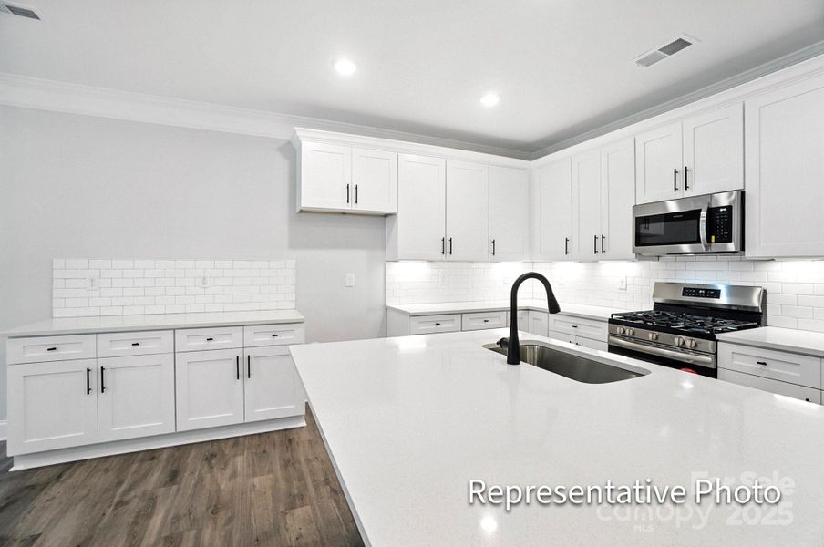Furnished interior view inside a new home in Harrisburg Village Townhomes, Harrisburg (Image 3).