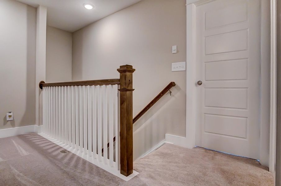 Spacious, unfurnished interior of a new home in The Enclave at French Quarter Creek, Huger (Image 22).