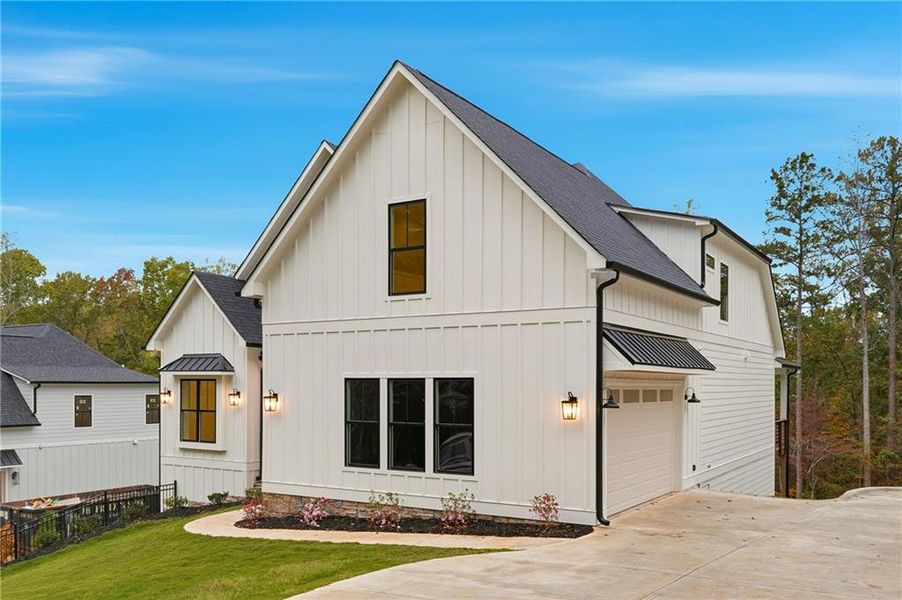Front exterior of a new home in , Cumming, GA, highlighting curb appeal (Image 28).