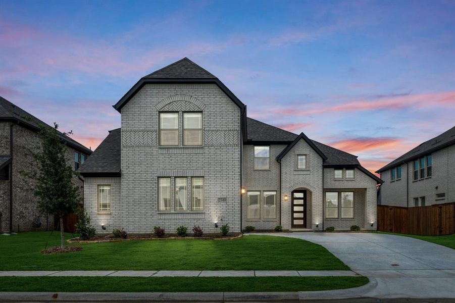 Front exterior of a new home in Sonoma Verde, Rockwall, TX, highlighting curb appeal (Image 2). Front exterior of a new home in Sonoma Verde, Rockwall, TX, highlighting curb appeal (Image 2).