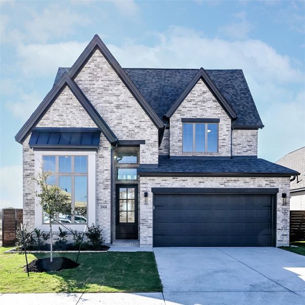 Front exterior of a new home in Juniper Springs, Lockhart, TX, highlighting curb appeal (Image 17).