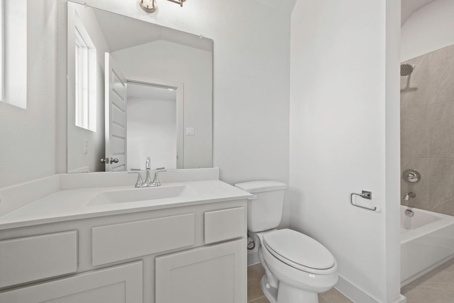 Furnished interior view inside a new home in Brookewater, Rosenberg (Image 12).