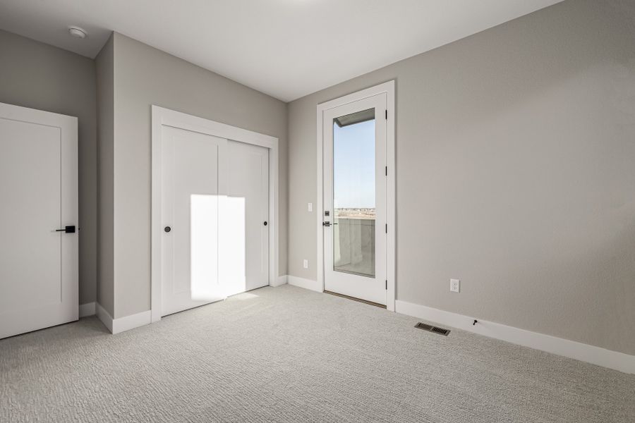 Spacious, unfurnished interior of a new home in West Grange, Longmont (Image 36).