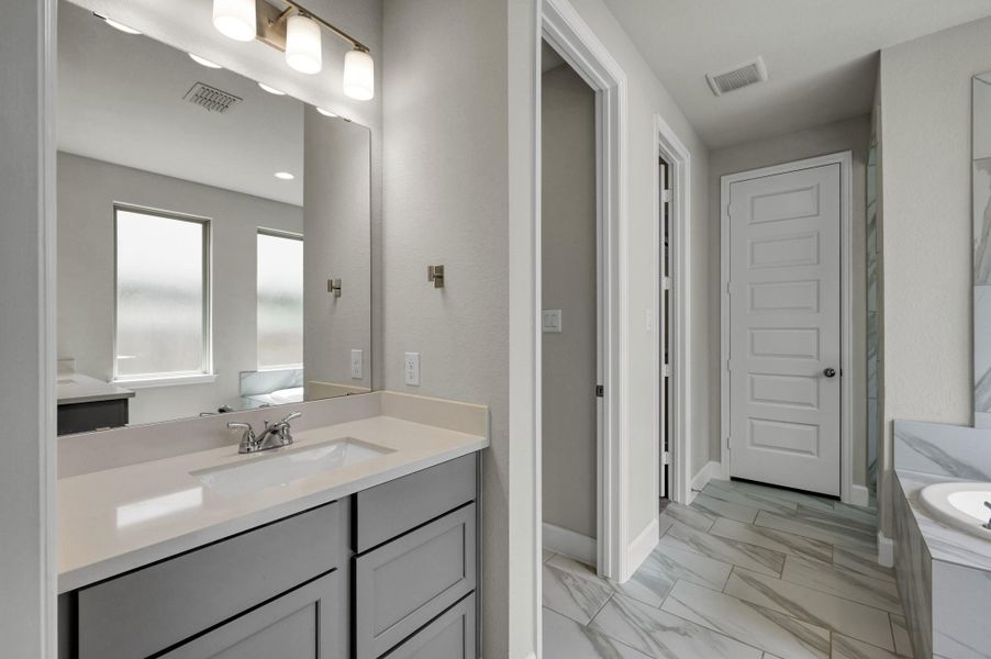 Furnished interior view inside a new home in The Woodlands Hills, Willis (Image 9).