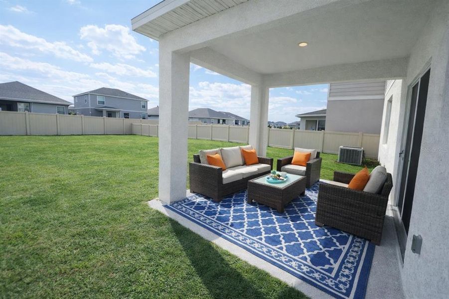 Exterior details and patio area of a home in Broadleaf, Parrish (Image 37).