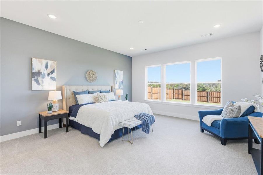 Primary bedroom with sitting area
