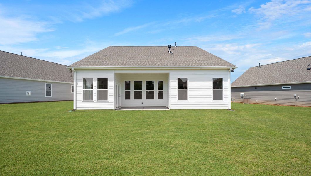 Front exterior of a new home in Whitehawk Meadows, Travelers Rest, SC, highlighting curb appeal (Image 2). Front exterior of a new home in Whitehawk Meadows, Travelers Rest, SC, highlighting curb appeal (Image 2).