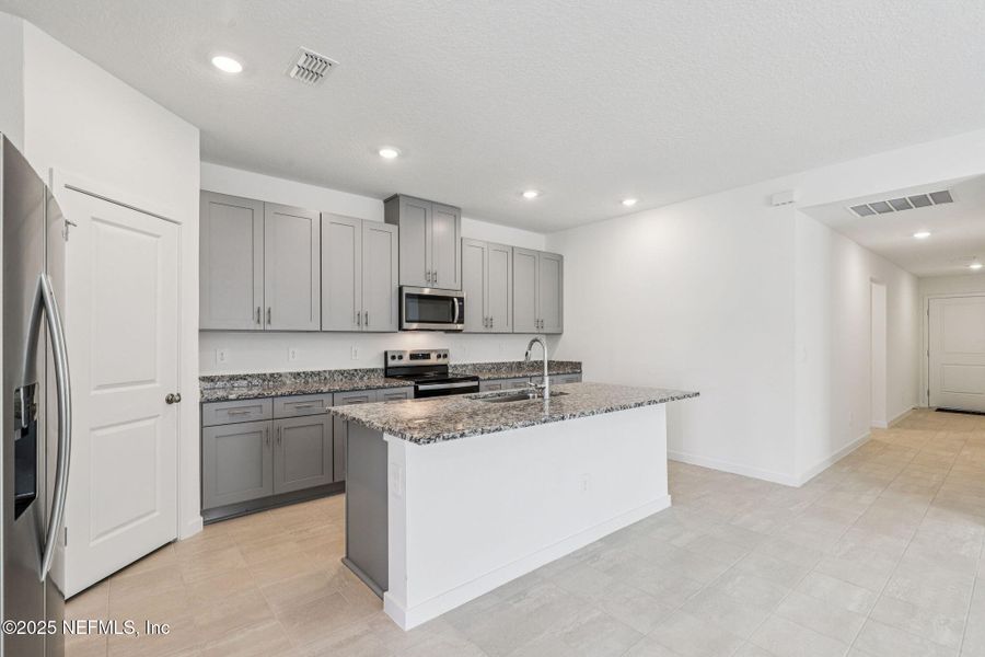 Furnished interior view inside a new home in Azalea Creek, Jacksonville (Image 8).