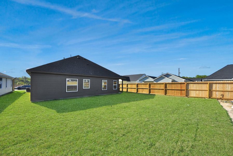 Exterior details and patio area of a home in Hill & Dale Ranch, Splendora (Image 23).