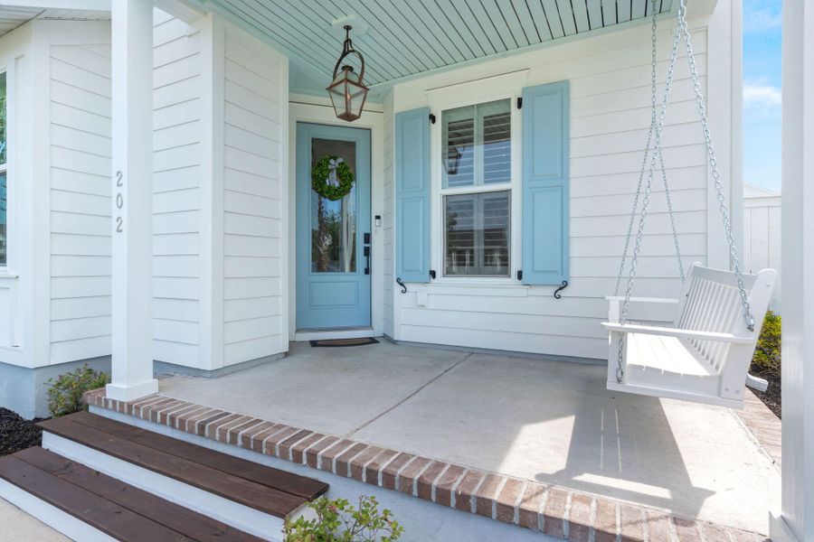Front exterior of a new home in Nexton, Summerville, SC, highlighting curb appeal (Image 24). Front exterior of a new home in Nexton, Summerville, SC, highlighting curb appeal (Image 24).