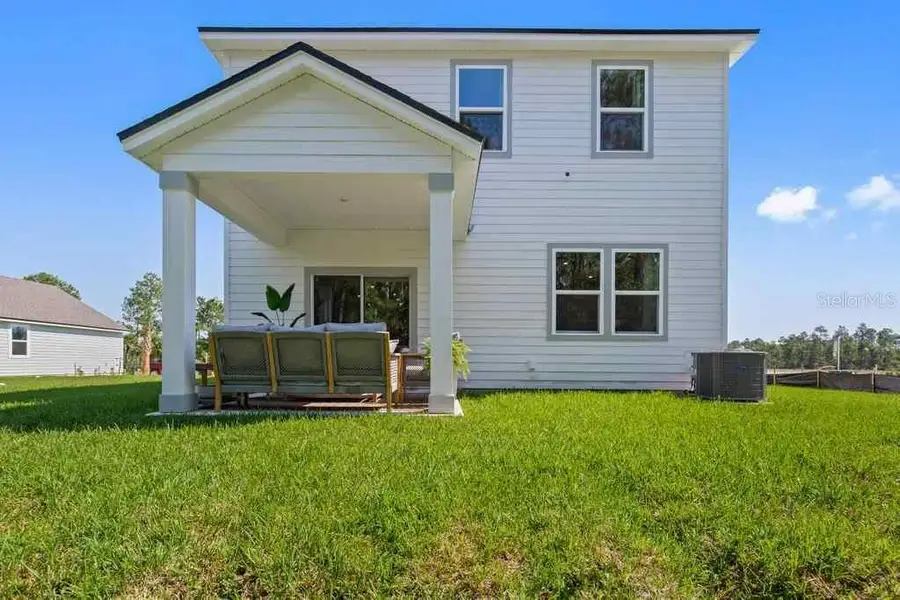 Exterior details and patio area of a home in , Palm Coast (Image 23).