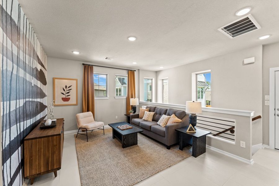 Representative furnished interior of a home built from the Capeside – Courtyard Collection by Chesmar Homes in Jordan Ranch, Pattison (Image 7).