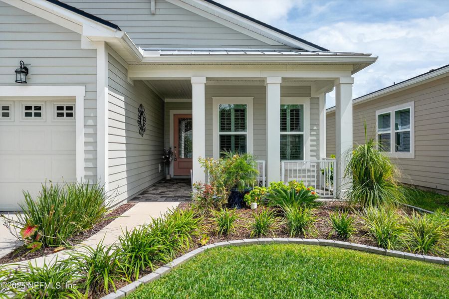 Front exterior of a new home in , St. Johns, FL, highlighting curb appeal (Image 19). Front exterior of a new home in , St. Johns, FL, highlighting curb appeal (Image 19).