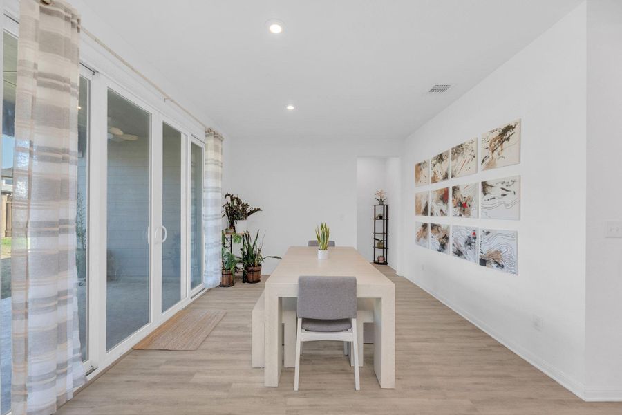 Furnished interior view inside a new home in Seasons at Carillon, Manor (Image 14).