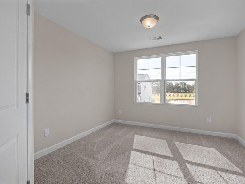 Spacious, unfurnished interior of a new home in Springvale, Fuquay Varina (Image 22).