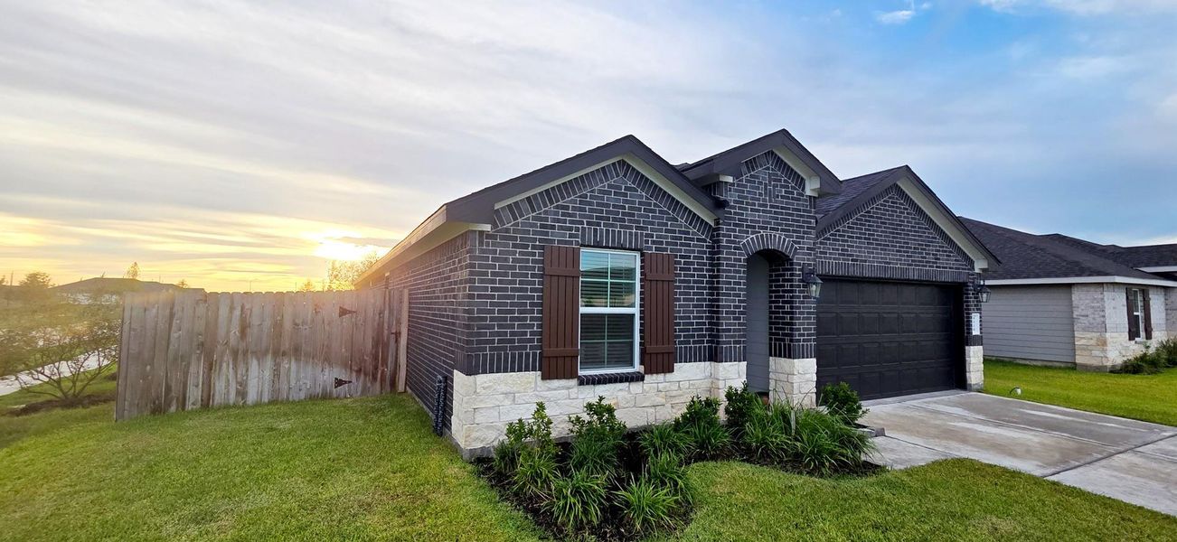 Front exterior of a new home in , Rosharon, TX, highlighting curb appeal (Image 2). Front exterior of a new home in , Rosharon, TX, highlighting curb appeal (Image 2).