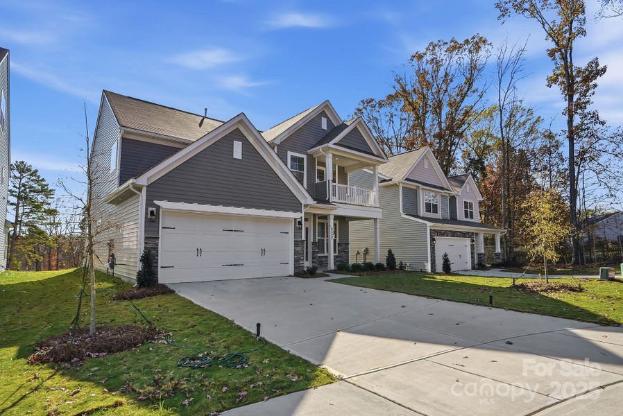 Front exterior of a new home in Grier Meadows, Charlotte, NC, highlighting curb appeal (Image 2).