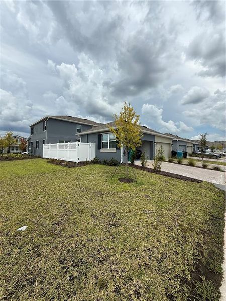 Front exterior of a new home in , Orlando, FL, highlighting curb appeal (Image 2). Front exterior of a new home in , Orlando, FL, highlighting curb appeal (Image 2).
