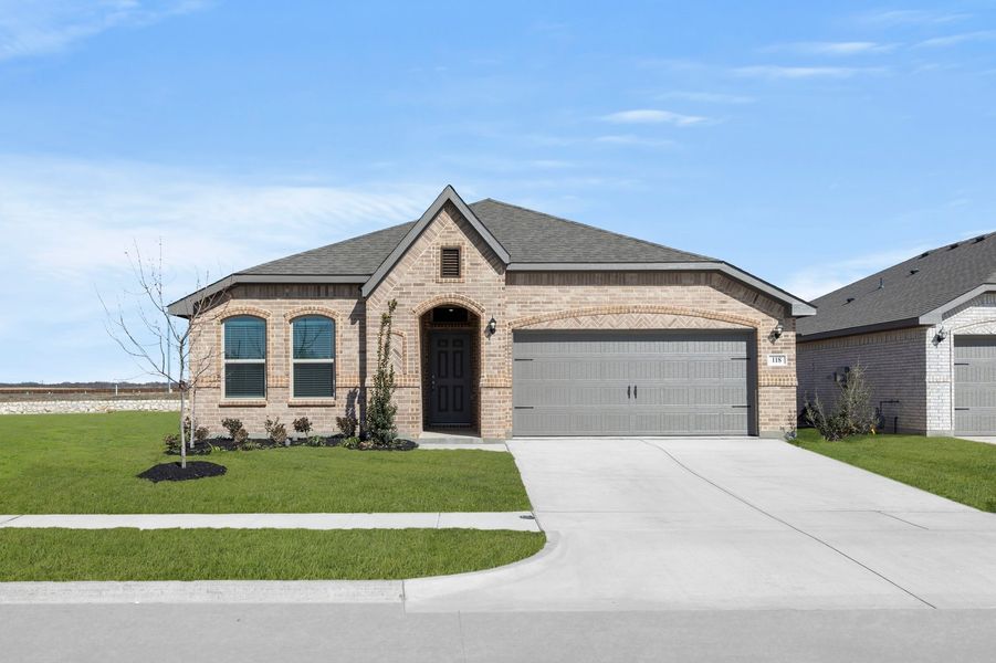 Front exterior of a new home in Northspur, Terrell, TX, highlighting curb appeal (Image 1). Front exterior of a new home in Northspur, Terrell, TX, highlighting curb appeal (Image 1).
