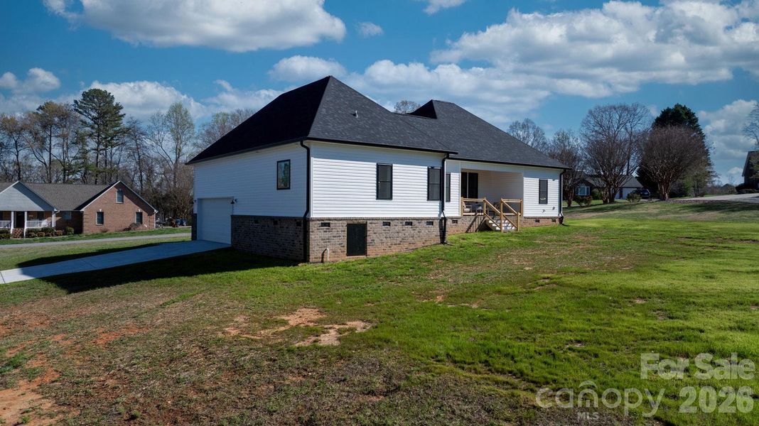 Exterior details and patio area of a home in , Conover (Image 3).