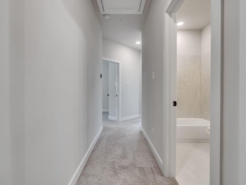 Spacious, unfurnished interior of a new home in Meridiana, Manvel (Image 20).