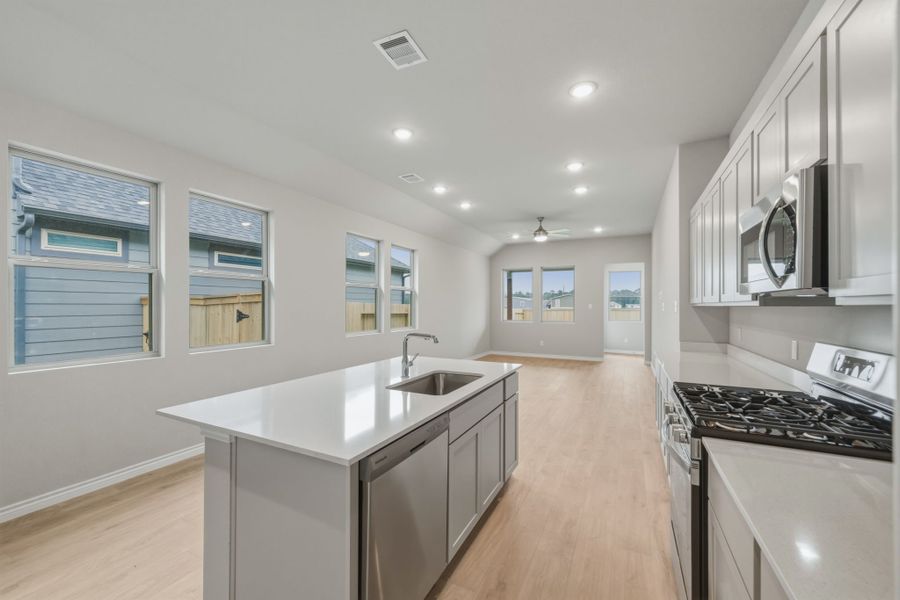 Kitchen in the Cedar home plan by Trophy Signature Homes – REPRESENTATIVE PHOTO Kitchen in the Cedar home plan by Trophy Signature Homes – REPRESENTATIVE PHOTO