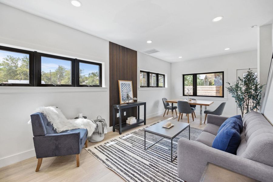 Living room featuring recessed lighting and wood finished floors