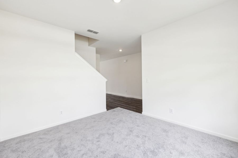 Representative unfurnished interior of a home built from the Galileo by Starlight Homes in Rolling Glen, Hutto (Image 21).