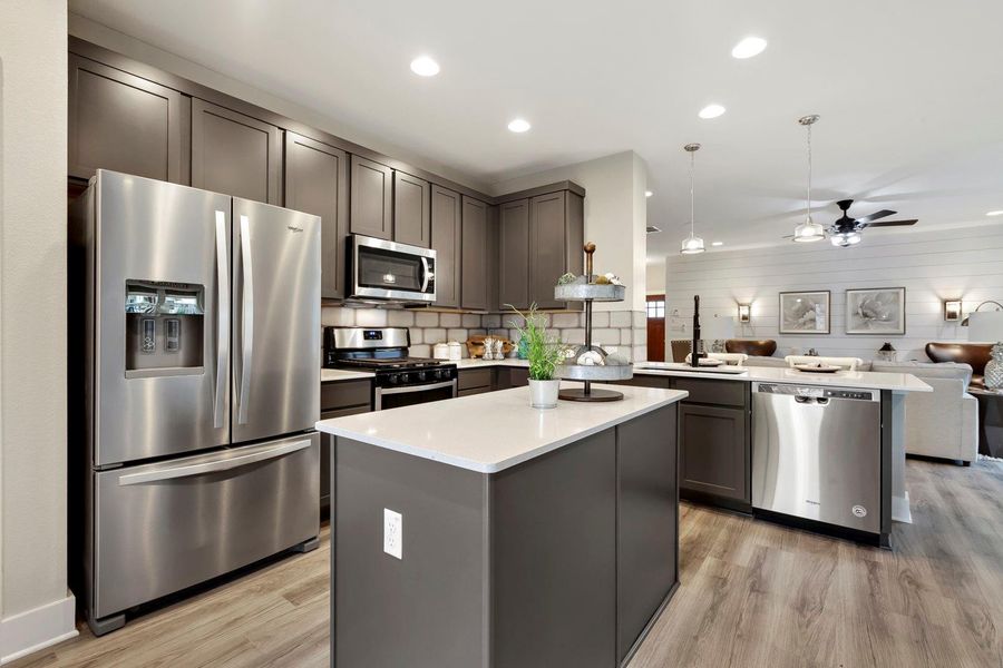 Furnished interior view inside a new home in Village at Manor Commons, Manor (Image 9).