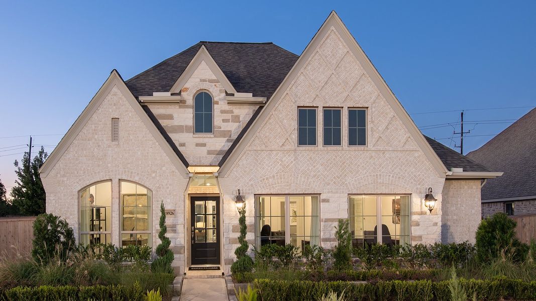 Front exterior of a new home in Briggs Ranch, San Antonio, TX, highlighting curb appeal (Image 21).