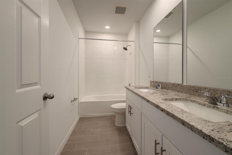 Furnished interior view inside a new home in Deer Run at Crosswinds, Davenport (Image 8).