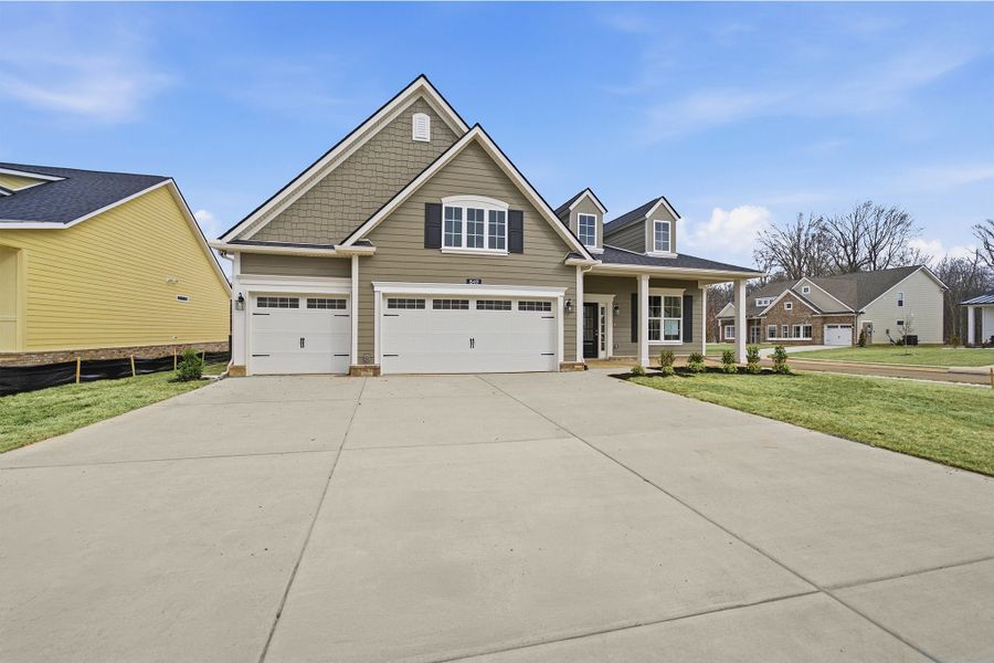 Front exterior of a new home in Dorris Farm, White House, TN, highlighting curb appeal (Image 2).