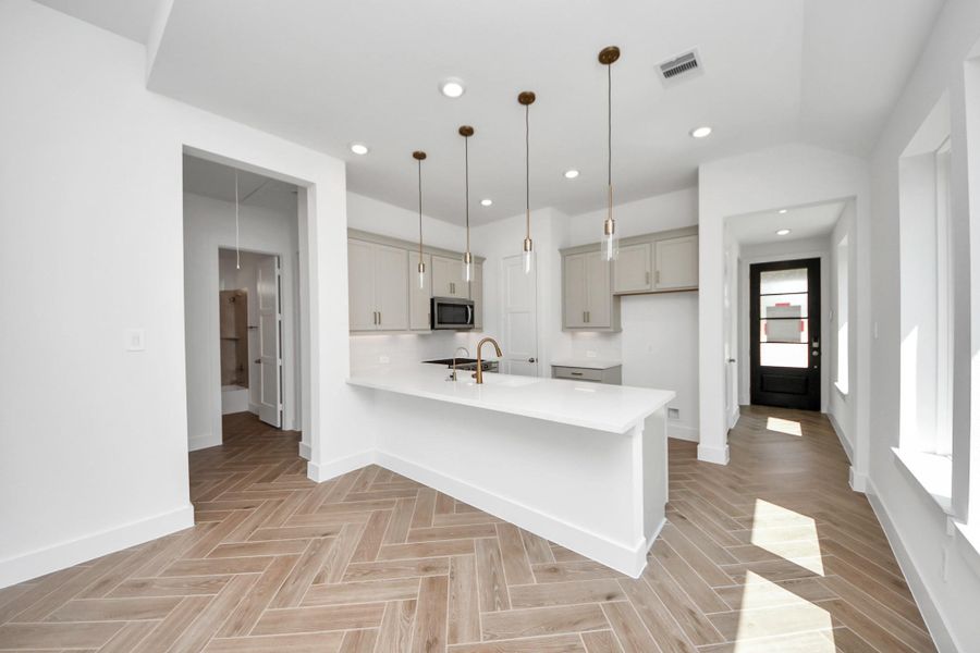 Furnished interior view inside a new home in Amira: Premier Collection, Tomball (Image 10).