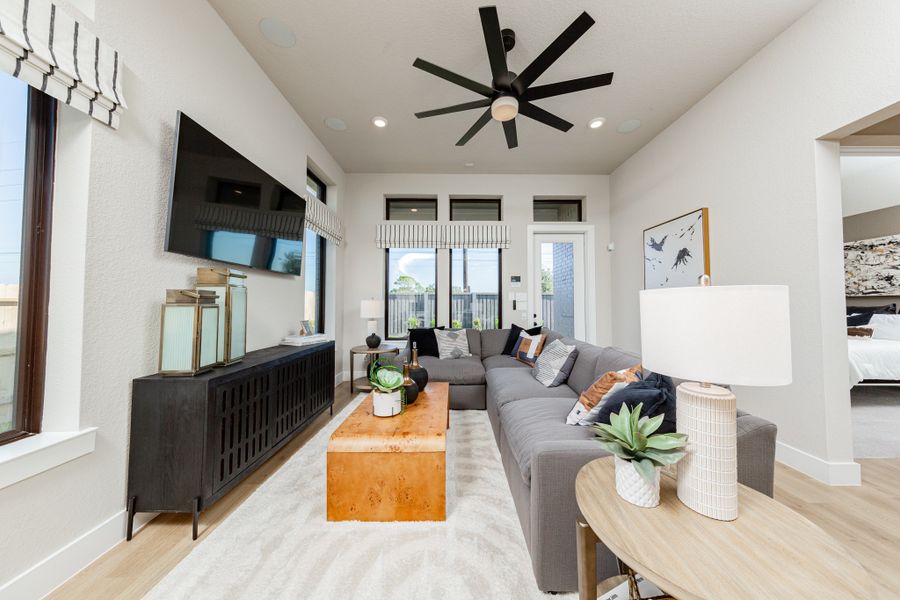 Representative furnished interior of a home built from the Cambridge by Beazer Homes in Meridiana, Iowa Colony (Image 6).