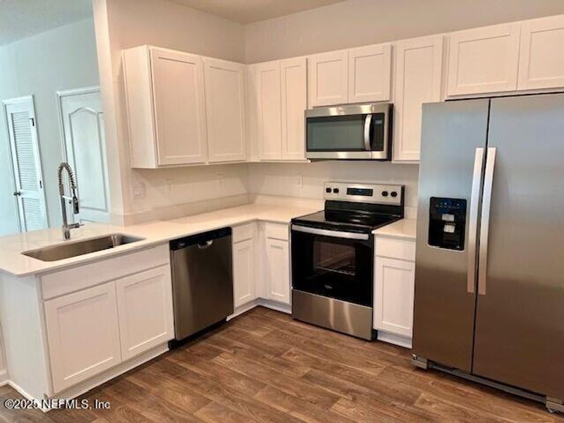 Furnished interior view inside a new home in Corsair, Middleburg (Image 7).