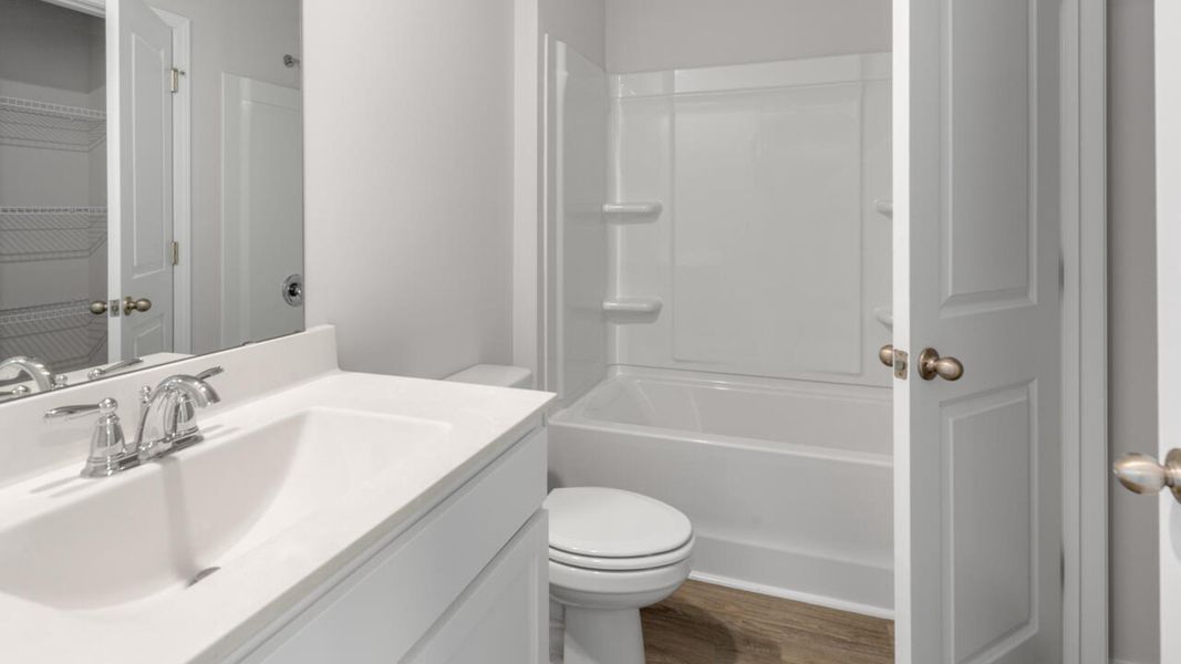 Furnished interior view inside a new home in Grayson Park Townhomes, Leland (Image 10).