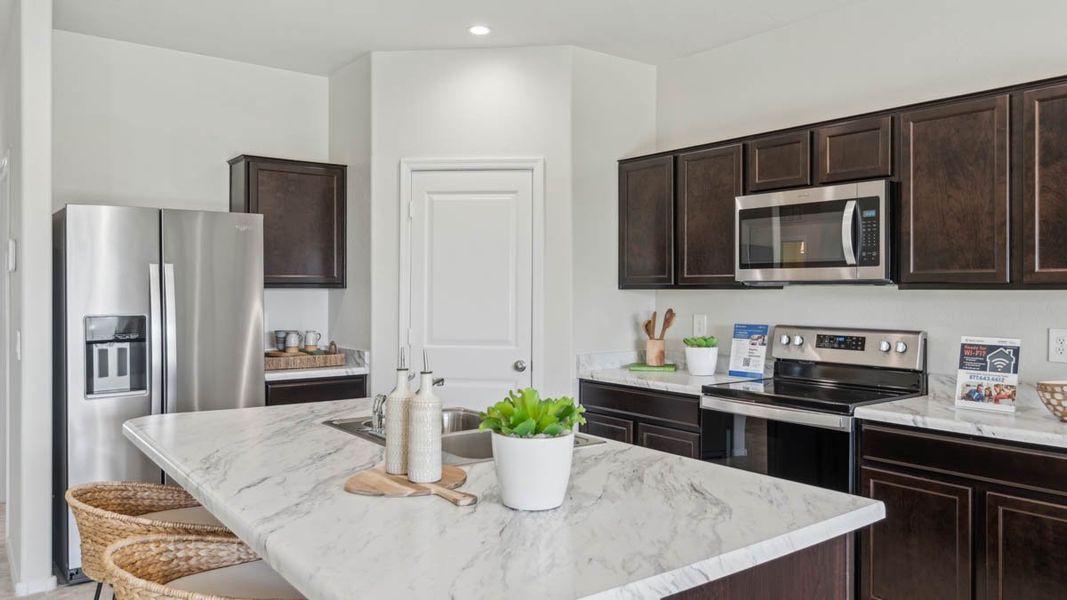 Furnished interior view inside a new home in Heartland Ranch, Coolidge (Image 7).