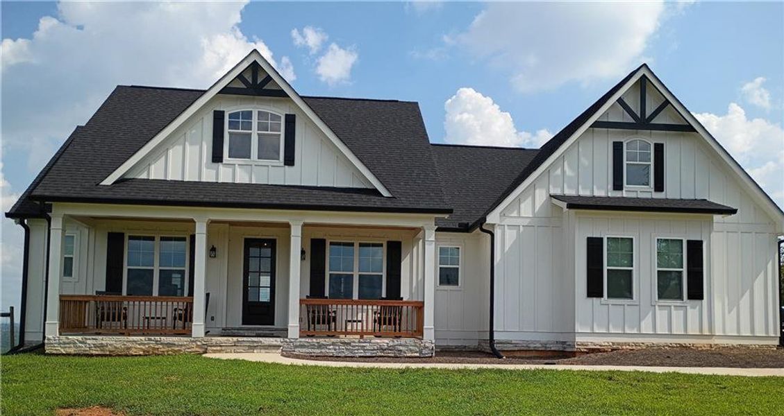 Front exterior of a new home in , Dallas, GA, highlighting curb appeal (Image 24).
