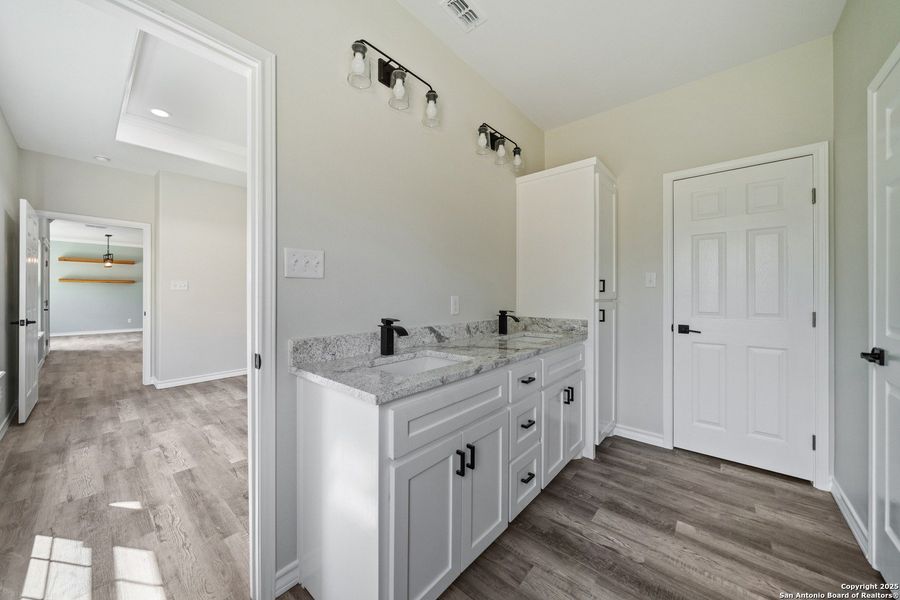 Furnished interior view inside a new home in , Beeville (Image 8).