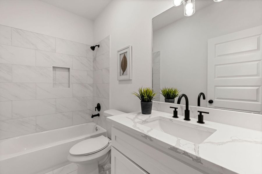 Photos are of a similar home – actual finishes and features may differ.