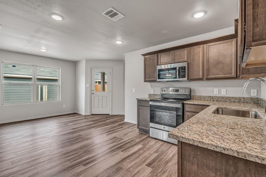 **Photos are sample photos of similar plan. Colors and features might vary**
