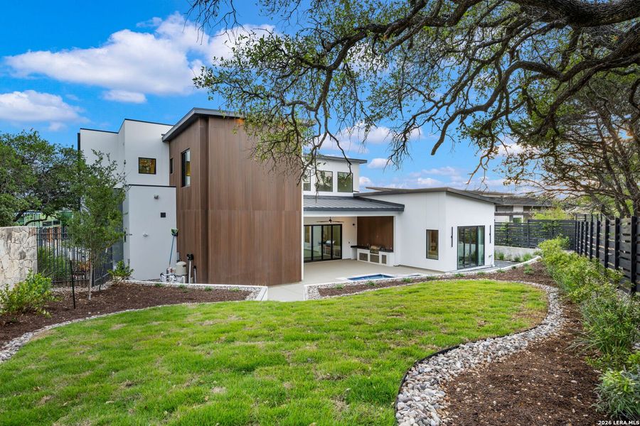 Exterior details and patio area of a home in , San Antonio (Image 29).