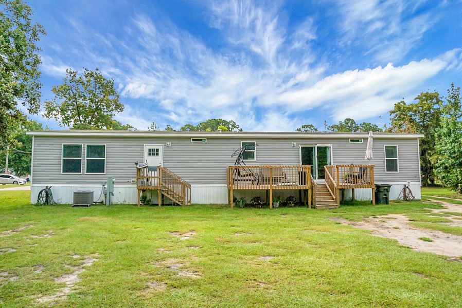 Front exterior of a new home in , Bonneau, SC, highlighting curb appeal (Image 26).