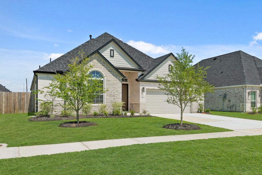 Front exterior of a new home in Briarwood Crossing, Rosenberg, TX, highlighting curb appeal (Image 15).