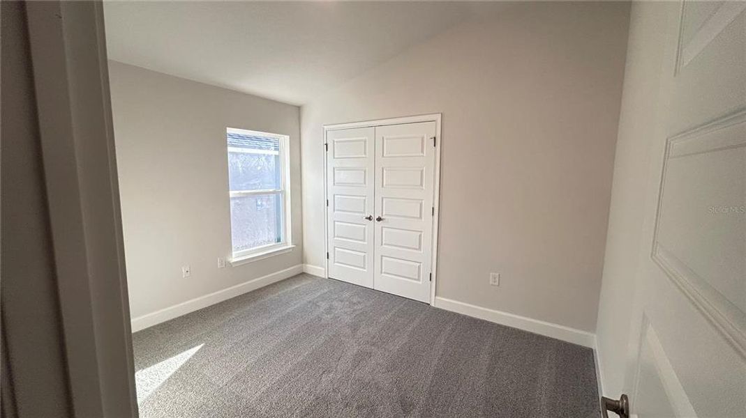 Spacious, unfurnished interior of a new home in Abbey Glen, Dade City (Image 12).