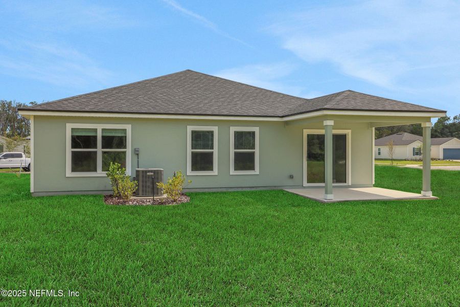 Front exterior of a new home in Wilford Oaks, Orange Park, FL, highlighting curb appeal (Image 18). Front exterior of a new home in Wilford Oaks, Orange Park, FL, highlighting curb appeal (Image 18).