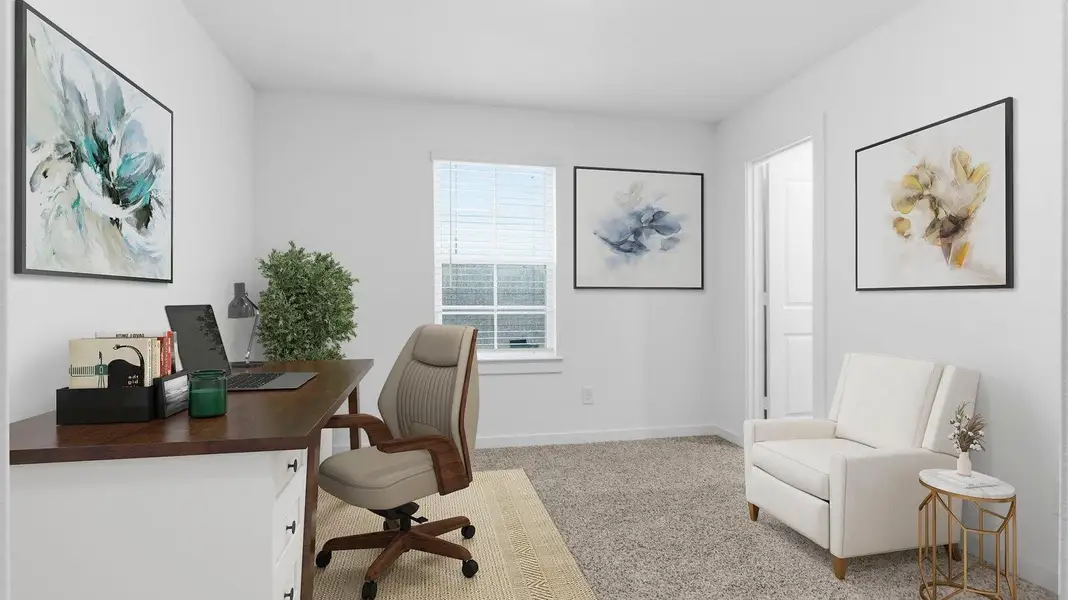 A bedroom shown as an at home office with a bright window allowing natural light to enter. A bedroom shown as an at home office with a bright window allowing natural light to enter.