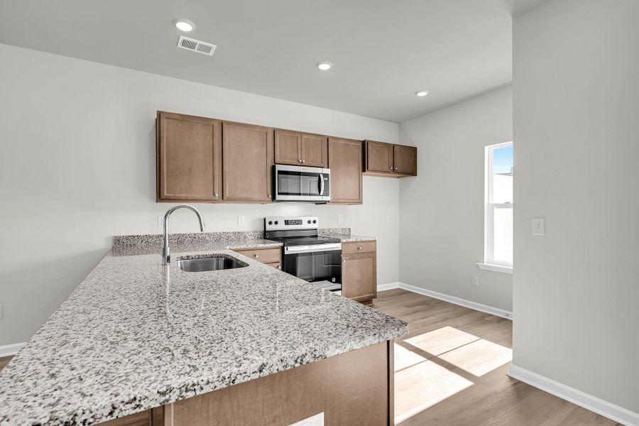 Furnished interior view inside a new home in Lakeview Commons, Goose Creek (Image 9).