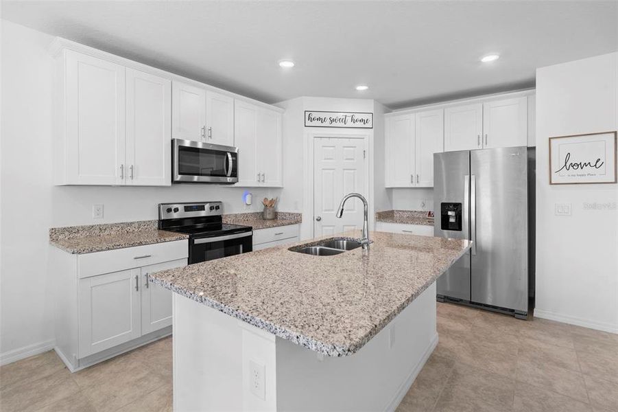 Furnished interior view inside a new home in Deer Run at Crosswinds, Davenport (Image 20).